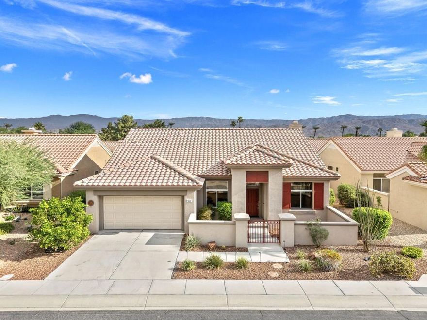 This rare Casablanca floorplan has A NEW HVAC SYSTEM IN 2022, a newer hot water tank, new carpet and pads, newer washer and dryer, and new disposal. It has 2 bedrooms, a large den, a small bonus flex room, and 2 full bathrooms. It is Located in the best 55+ community in the Valley, Sun City Palm Desert. With newer exterior paint, and a gated courtyard, the curb appeal is fabulous. The home has high ceilings, a formal dining room, spacious living room and a family room complete with a cozy fireplace. The well designed kitchen is open to the family room, and offers corian countertops, a center island, custom pull out shelving, and a bright, cheery kitchenette, with a view to the northeast facing backyard. The master bedroom is roomy, with a huge picture window looking out to the serene, desert landscaped yard. The bathroom has a walk-in shower, custom walk-in closet, double vanity and a bathtub. The guest bedroom is adjacent to the 2nd full bathroom and is very comfy and inviting. The original laundry room is now a small flex room with many possibilities. The 2 car garage has wall to wall custom built-in storage, and a convenient laundry area. SUN CITY PALM DESERT IS ALL ABOUT LIFESTYLE!! It has many clubs, activities, amenities, 24 hr. security, and low HOA dues. Play at 2 championship 18-hole golf courses and practice facilities, pickle ball, tennis, softball, bocci ball, an 18-hole miniature golf course, an honor library, arts and crafts, a ballroom for special entertainment, and 4 saltwater pools kept at 87 degrees with hot tubs. Enjoy 2 great restaurants, a martini/coffee bar, and even a post office. There is a newly renovated classy indoor/outdoor bar with fire tables to enjoy the awesome views and our beautiful desert weather..