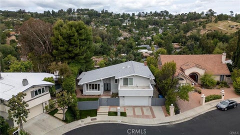 Photo of 19281 Berclair Ln LN, Tarzana, CA 91356 (MLS # GD26219990)