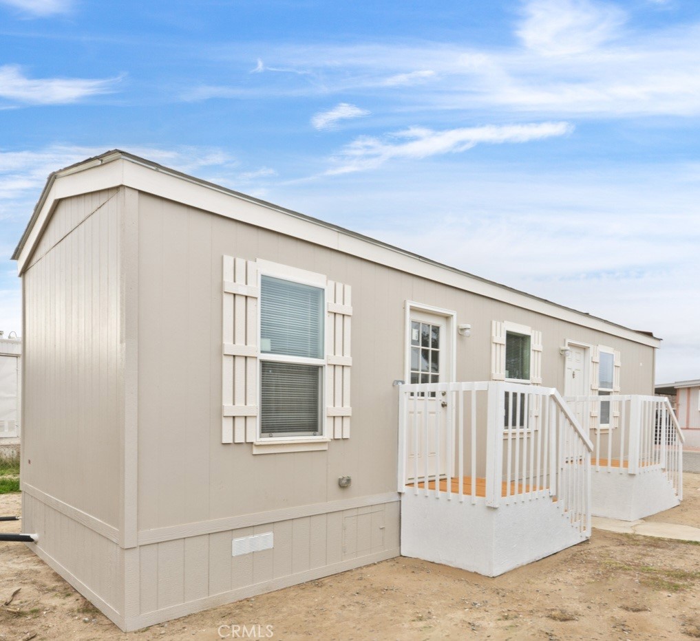 Gorgeous NEW manufactured home being built at the factory and scheduled to be delivered SOON to space #13! Nice, gated family park.