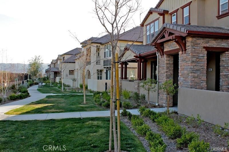 Lovely Valencia Townhome! Terrific floor plan with dining area, open kitchen with island, gleaming granite slab counters and back splash, gorgeous Maple cabinetry with concealed hinges. Ceramic tile flooring and wood-like flooring. Three large bedrooms upstairs. Master Suite offers Walk-in closet and Master bath with dual vanities and Maple cabinetry. Ceramic tile flooring and marble slab counters in all bathrooms. Two car garage with direct access. Private patio. Excellent school district. Public park nearby. Small pets will be considered.