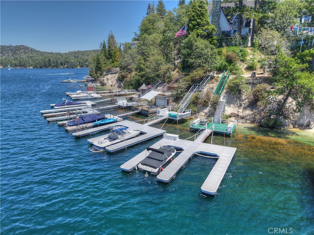 Brand new aluminum dock! Half of a double dock and large platform above dock with plenty of room to entertain. Great deep water location near Bob's Beach and perfect for watching sail boat races, fireworks and amazing sunsets! Enjoy the peace of mind that comes with owning a brand new dock slip! Benefit from the lower maintenance costs and longer expected lifetime of aluminum docks when compared to wood docks.