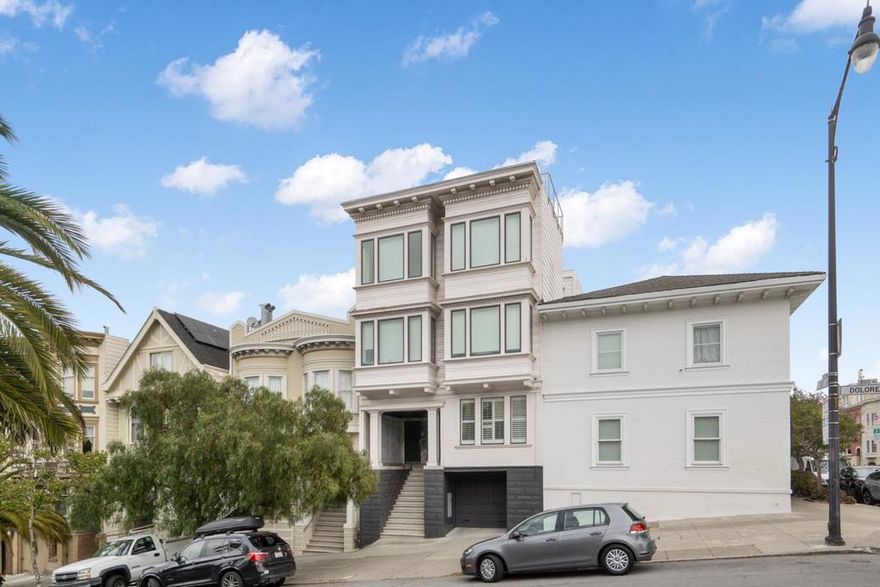 Updated full-floor Edwardian condo adjacent to Mission Dolores Park. Welcoming floor plan w/ living, dining, and kitchen all overlooking the tranquil shared garden. 2 generously sized bedrooms plus a third bedroom perfect for a children's room, guest room, or home office. Classic details like matchstick hardwood floors and box beam ceiling blend artfully w/ remodeled kitchen, baths. Parking, storage, in-unit laundry - the whole package. The Liberty Hill Historic District offers gorgeous architecture, walkability, and great weather. This is where it's happening. Dolores Park, Mission Dolores, Valencia Corridor, the Castro, and Noe Valley are at your doorstep. Bi-Rite, Tartine, Foreign Cinema, Delfina... Of course, excellent Muni, BART and freeway access too.