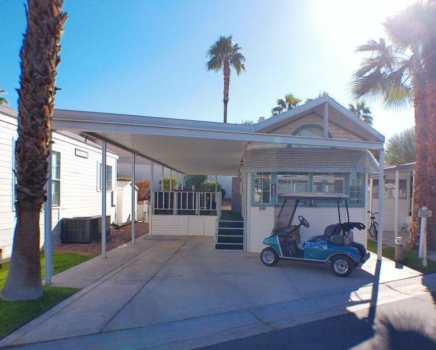 This Hallmark Park Model has upgrades through-out. Clean and located on the back East Wall with a shaded covered deck to enjoy. A washer/dryer is located in the back shed. Well-appointed and is a pleasure to show. Located in a quiet area of the park. The Golf Cart is negotiable outside of escrow. Ready to Move in, just bring your personal effects.