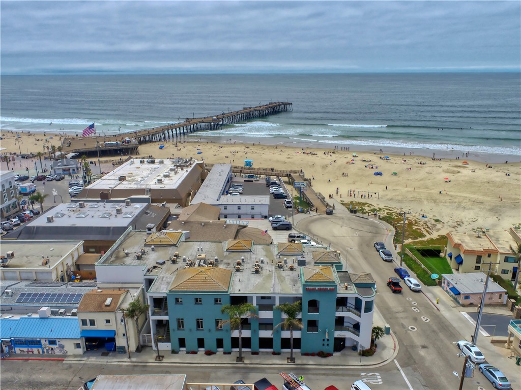 Exceptional oceanview condo in downtown Pismo Beach! This spacious one-bedroom, one-bathroom condo at the Beach House Inn offers the perfect blend of investment potential and personal retreat. At 641 square feet, this unit is larger than many in the building. Enjoy ocean views from your private balcony on the third floor, just steps from the famous Pismo Beach Pier and within walking distance of iconic downtown destinations. The thoughtfully designed living space features a private bedroom with ample storage, kitchen with full-size refrigerator and electric stovetop, spacious living area with dining space, well-appointed bathroom, and private balcony perfect for taking in the coastal atmosphere. This turnkey investment features professional property management that handles all bookings, cleaning, and guest services, with a strong rental history and steady year-round bookings. Owner usage up to 90 days per calendar year per Coastal Commission regulations. The Beach House Inn is a well-maintained building with secure parking and designated spot in locked garage plus elevator access for convenience. All utilities and insurance are included in HOA dues, and the professional management team maintains the property's excellent reputation among guests. Perfect for investors seeking passive income or anyone wanting their own slice of coastal paradise in California's beloved Pismo Beach.