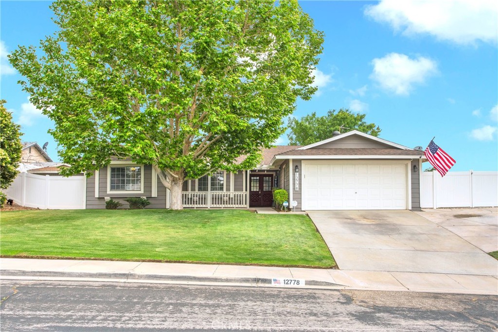 Welcome Home! This home sits in one of the most desirable and fast moving neighborhoods in Victorville! With inviting curb appeal featuring an outdoor covered seating area and a beautifully curated front yard you are beckoned to step inside with high ceilings and views of your private well treed backyard! An updated open concept kitchen pours into a large living room and dining space with a fireplace to cozy up to on cold desert nights! But don't worry, we haven't forgotten about those warm summer days, this home offers central air conditioning and has an additional evaporative cooler located in the main living space! The home has four well sized bedrooms with a primary suite that boasts an oversized walk in closet with a renovated spa like bathroom! Stepping into the backyard you are met with mature trees, newer vinyl fencing and lush green grass neighboring a gravel area for outdoor activities. The side yard comes complete with RV parking and a swinging double gate for easy accessibility! This home is the epitome of pride in ownership and is ready for its new owners!
