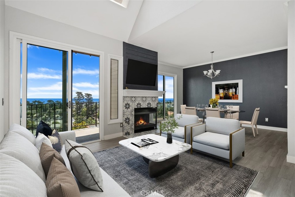 A Rare Gem with Unmatched Ocean Views in Ventura! Perched high on a historic hillside just below Grant Park, this stunning contemporary-modern townhome offers jaw-dropping, unobstructed 180° views of the ocean, Channel Islands, and the vibrant city below. A true showcase property, this residence blends architectural beauty with a once-in-a-lifetime location. Step inside to discover an open-concept layout featuring 3 spacious bedrooms, a versatile second-story office/loft, and 2.5 bathrooms. The home also includes an oversized attached two-car garage with direct entry, plus a huge third-floor basement/storage area. The updated kitchen features modern cabinetry, granite countertops, a sleek bar area, stainless steel appliances, and stylish fixtures. Additional upgrades include newer laundry appliances, all new bathrooms, and elegant flooring in the living and dining areas.
Located in one of Ventura County’s most iconic destinations, you’ll enjoy a semi-private setting with easy access to downtown Ventura’s dynamic shops, restaurants, and cultural attractions. Just a short stroll brings you to popular hiking trails with awesome views, the shoreline, boardwalk, white sand beaches, and the historic Ventura Pier. This is more than a home—it’s a rare opportunity to own a piece of paradise. Make this remarkable property your next dream home. Some photos have virtual staging.