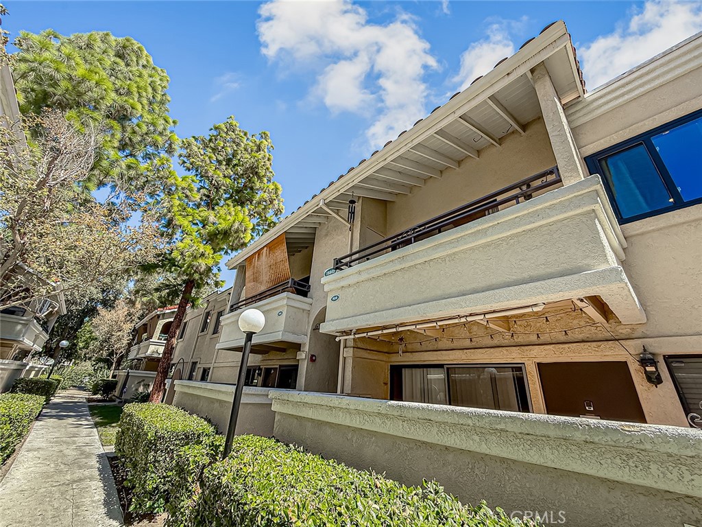 Attention All Santa Clarita Buyers & Agents! Wait Till You See This Upgraded Super Sharp 2nd Floor, Single Level End Unit Showplace Wonderfully Located In The Highly Sought After Confetti Resort Style Community In Perfect Move In Condition With It’s Own Private In Unit Washer & Dryer! Fantastic Amenities Include Two Pool, Spa, Tennis Courts, Fitness Center, Clubhouse & More. Trash & Water Are Also Provided By The HOA. Along With Two Assigned Side By Side Parking Spaces! Updates Include Amazing Soaring Ceiling! Beautiful Floors! Light & Bright! Private Balcony! Excellent Floor Plan! Lovely Living Room! Granite Cook’s Kitchen With Stainless Steel Appliances & Lots Of Storage! Marvelous Main Bedroom Suite! Terrific Room Sizes! Incredible Location! Moments To Shopping, Restaurants, Regal Cinema, Costco & Much More! If You Are Only Seeing One Sensational Santa Clarita Condominium In The Price Range, Make Sure 18802 Mandan St #908 Is It! Must See! Do Not Miss! Santa Clarita Living At Its Best!