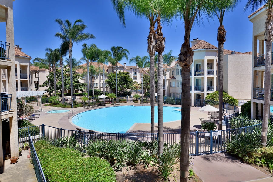 Beautiful complex set along the San Diego River Valley, yet in the heart of San Diego and the shopping district. Spacious unit with fireplace and large balcony. Features upgraded granite kitchen and bath counters, crown molding, closet system, 2nd BR walk-in, newer carpet, 2 prkg spots & bike storage. Complex features pool/spa & fitness room. Short stroll to cafes, restaurants, Trader Joes, shopping and more. Access to all fwys and trolley. Minutes to the beach, Downtown San Diego or to the mountains! Neighborhoods: Mission Valley Complex Features: ,,,,, Equipment: Dryer, Washer Other Fees: 0 Sewer: Sewer Connected Topography: LL