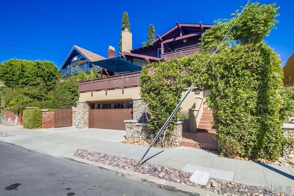 A rare South Park masterpiece, this residence blends the timeless elegance of a classic Craftsman with the ease and sophistication of modern living. Built just 20 years ago, it captures the character of an original while offering the comfort, flow, and functionality that today’s buyers demand. The oversized primary suite opens to a private deck with sweeping skyline views of downtown San Diego. Multiple decks and a newly landscaped backyard extend the living space outdoors, creating an entertainer’s dream and a serene retreat all in one! Within the interior, rich details set this home apart: a custom mahogany fireplace and cabinetry, handcrafted Laird Plumleigh tiles, solid oak floors, quarter-sawn white oak kitchen and family room cabinetry, and custom wood windows throughout. Original architectural drawings are included for added authenticity. Freshly painted in 2025, the home feels crisp and move-in ready. Adding to its allure is the rare luxury of a two-car garage, an exceptional find in South Park. Just steps from South Park’s vibrant mix of dining, boutiques, coffee shops, yoga studios, and Balboa Golf Course, this home offers the perfect blend of privacy, elegance, and walkability.