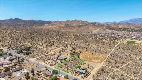 Photo of 8776 Warren Vista Avenue, Yucca Valley, CA 92284 (MLS # JT25216131)