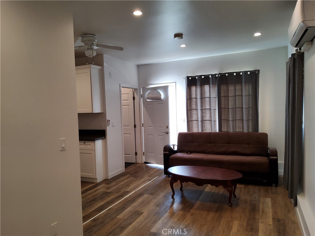 ADU, Utilities included, Electric, Gas, Water, Sewer, and trash, flat no steps, laundry hook ups, frig stove included, parking for small Car or park on street, can be Partial furnished if need it For additional charge, otherwise bring your own furniture, walking distance for transportation.