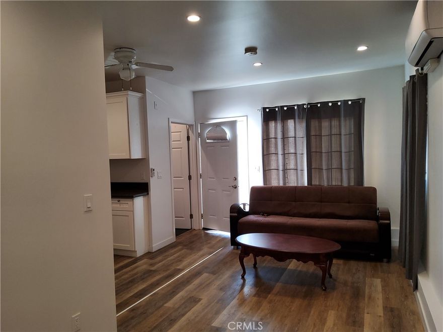 ADU, Utilities included,  Electric, Gas, Water, Sewer, and trash, flat no steps, laundry hook ups, frig stove included, parking for small Car or park on street, can be Partial furnished if need it For additional  charge, otherwise bring your own furniture, walking distance for transportation.