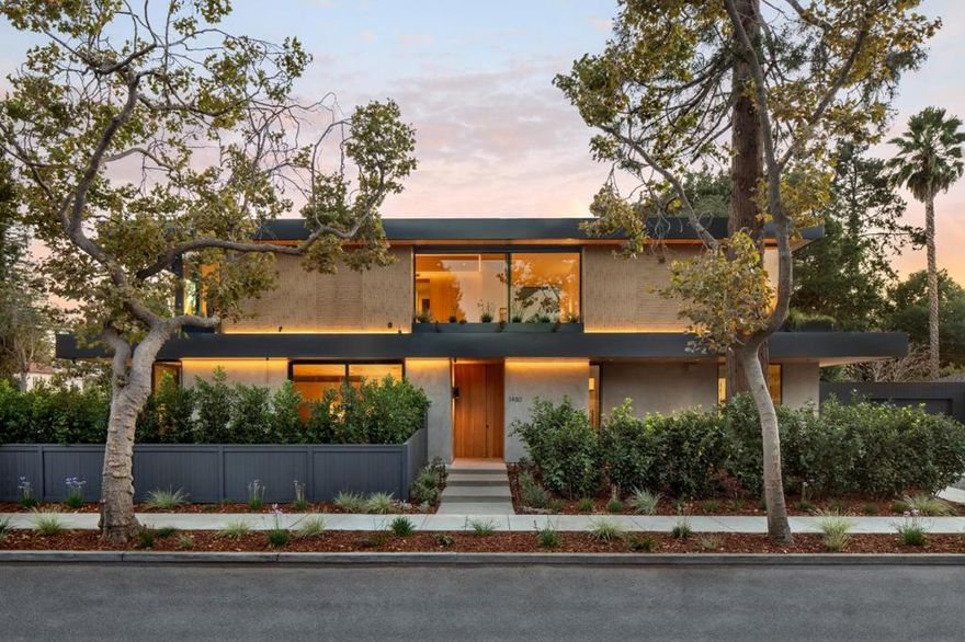 Just-completed, modern masterpiece in prestigious Old Palo Alto that redefines luxurious contemporary living through a perfect blend of organic tranquility and sleek design. Bathed in natural light from oversized windows and a dramatic three-story atrium, the home showcases impeccable attention to detail and the highest quality finishes. The expansive great room, framed by a wall of glass sliders, flows seamlessly to the private patio and rear yard for effortless indoor-outdoor living. A gorgeous top-of-the-line chefs kitchen anchors the home, while a Savant smart system controls lighting and audio throughout. Upstairs, three en-suite bedrooms include a serene primary suite with a garden-view balcony, spa-inspired bath, and a chic dressing room. The stunning lower level boasts soaring ceilings, an entertainment room with a striking stone bar, family room, home theatre, and guest suite with glass slider to the atrium. Completing this exceptional property is a sophisticated one-bedroom, one-and-a-half-bath ADU  and access to Palo Altos top-rated schools: Walter Hays Elementary, Greene Middle, and Palo Alto High.