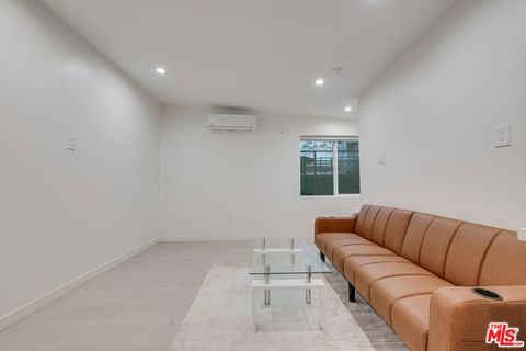 Photo of 8710 S Chalmers Street, Los Angeles, CA 90035 (MLS # 26639849)