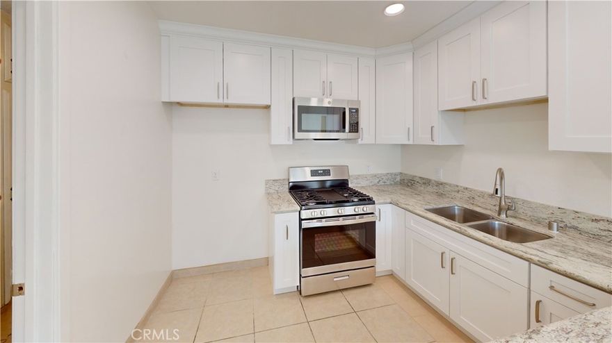 This single story/one level, 2 Bedroom, 2 Bath floor plan. Focused on comfort and energy efficiency, all windows are dual pane for lower utility bills. All stainless appliances and sink in addition to custom down lights and lighted ceiling fan in the dining area make cooking or relaxing in the kitchen/dining area a delight. A large window adds to its open and spacious atmosphere. Flooring within the unit is ceramic tile floors for easy cleaning while the living room and bedrooms are carpeted. Both bedrooms provide expanded windows, ceiling fans as well as mirrored wardrobe doors. The main bedroom also presents its own private bathroom. The second bedroom is conveniently located next to the guest bath. There is good cabinet storage in the hallway. Non Smoking unit, Small Pets will be considered, Landscaped Semi Private Fenced Front Yard, Privately Fenced Backyard w/Extended Patio accommodates outdoor furniture quite well, Stainless Gas Range &amp; Microwave, Stainless Bosch Dishwasher, Ceiling Fans in Many Rooms, Dedicated One Car Space in a Shared Garage with an Additional Dedicated Assigned Parking on Property, W/D Hookups in Shared Laundry Room, Owner pays Water and Trash.