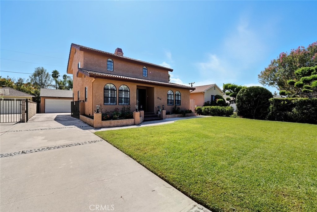 Welcome to 916 Othello Street, Arcadia – nestled on a quiet cul-de-sac, this beautifully updated 3-bedroom, 3-bathroom home offers the perfect blend of comfort, functionality, and style. Step through the double door entry into a bright and inviting floor plan featuring recessed lighting throughout, laminate flooring, and plantation shutters. The spacious living and dining rooms flow seamlessly into the open family room, while sliding glass doors lead to a private backyard with a covered patio, built-in BBQ area, and sink – perfect for entertaining. The updated kitchen is a chef’s delight, complete with granite countertops, soft-closing drawers, farmhouse sink, and recessed lighting. An inside laundry area adds convenience. Downstairs, you’ll find a bedroom with mirrored closet doors and a full bathroom featuring a granite countertop, tile flooring, and a glass shower door. Upstairs, the large master suite offers a walk-in closet and a luxurious en-suite bathroom with a double sink vanity, granite counters, self-closing drawers, walk-in shower with glass enclosure, and tile flooring. Additional bedrooms are generously sized and well-appointed. Other highlights include central air and heat, a detached 2-car garage, and a durable tile roof. Located in a desirable Arcadia neighborhood, this home combines modern upgrades with timeless charm.