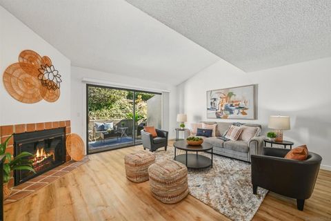 Photo of 7715 Saranac Pl Pl #3, La Mesa, CA 91942 (MLS # 260003296SD)