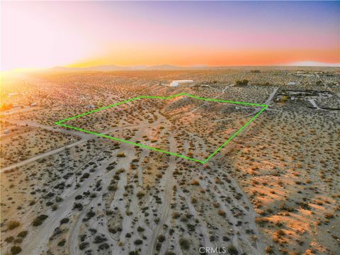 Photo of 4195 Avenida Del Sol, Joshua Tree, CA 92252 (MLS # JT25193876)