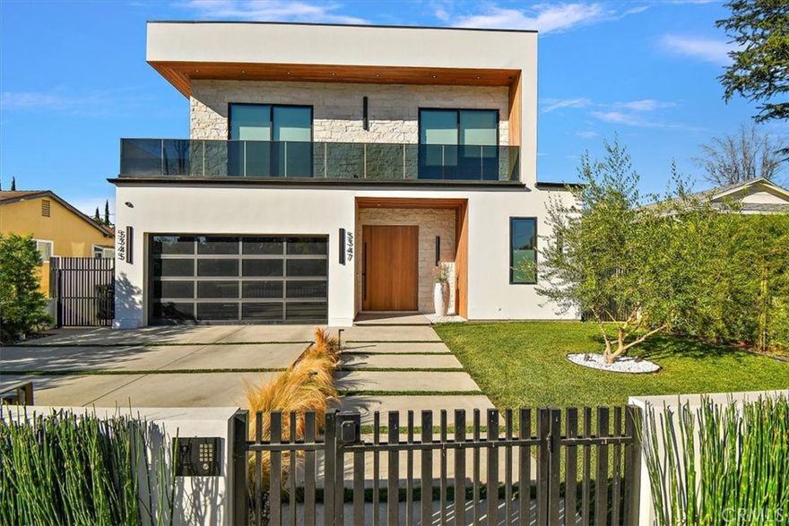 Stunning contemporary retreat available for lease in the heart of Sherman Oaks! This beautifully designed home offers soaring ceilings, abundant natural light, and seamless indoor-outdoor living. The spacious open layout features a chef’s kitchen with high-end appliances and a massive center island, opening to a living and dining area with a dramatic glass wall that connects directly to the private backyard. The luxurious primary suite includes a spa-like bathroom, walk-in closet, and private balcony, while additional en-suite bedrooms provide comfort and flexibility. Step outside to enjoy your own resort-style oasis with a sparkling pool, spa, built-in BBQ, and multiple lounge areas perfect for entertaining or relaxing. Ideally located just minutes from Ventura Boulevard’s dining, shopping, and nightlife, with easy access to both the Westside and the Valley.