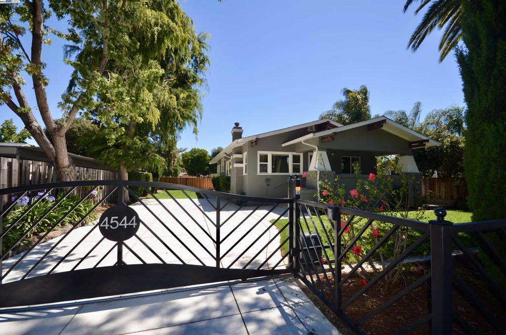 Welcome to 4544 Thornton Avenue in Fremont, CA! This charming home offers a delightful blend of comfort and potential with its 1,968 square feet of living space, including 5 bedrooms and 4 bathrooms. One of its standout features is an existing studio ADU nestled under the main house, perfect for guests or additional rental income. The expansive 11,510 square foot lot provides ample space for development of up to 8 units, whether you envision additional units to generate income, a family compound or a personalized backyard oasis. The home's welcoming layout boasts a bright living area and a modern kitchen, ideal for both entertaining and everyday living. Enjoy the comfort of updated amenities and the privacy of a cozy backyard. The location is ideal with easy access to 880 or Dumbarton Bridge for an easy commute to Silicone Valley or the Peninsula. This is a once in a lifetime opportunity — come see the potential for yourself!