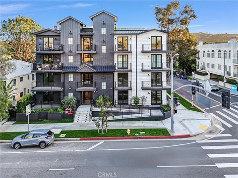 Photo of 10352 Riverside Drive #203A, Toluca Lake, CA 91602 (MLS # GD26049875)