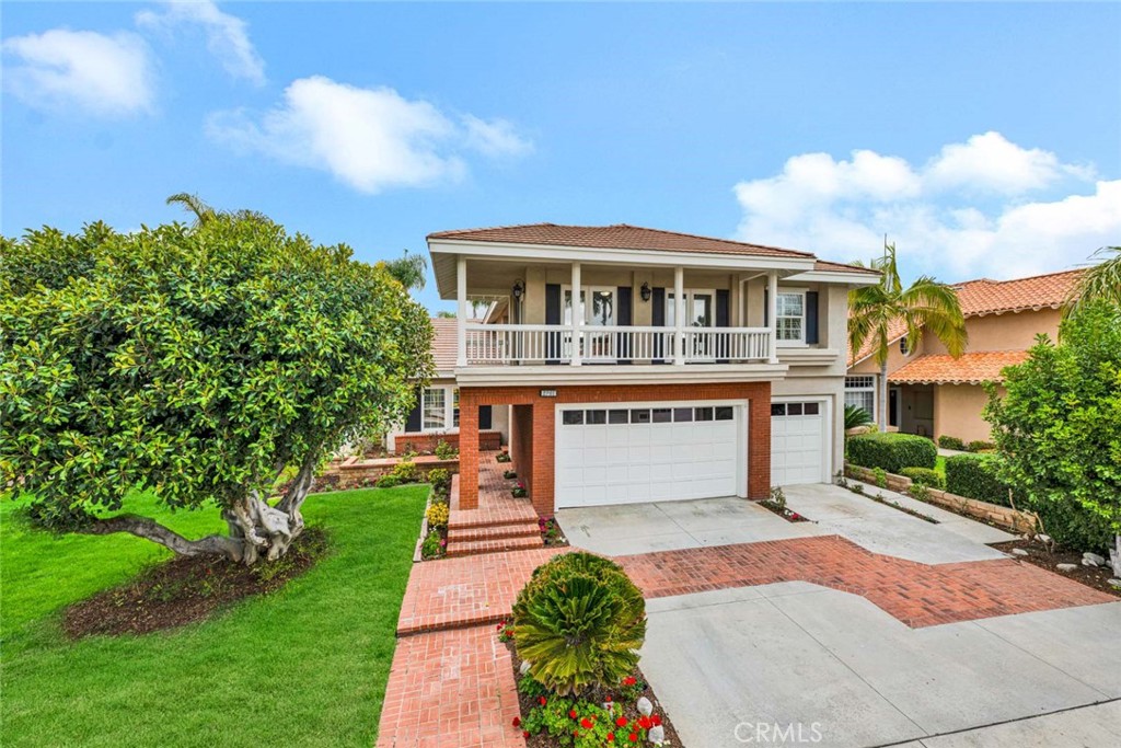 Welcome to 2201 Marselina Tustin – The Perfect Blend of Comfort, Style, and Location. Nestled on a quiet interior lot just steps from Heritage Park, this spacious home offers the ideal setting for gatherings. Enjoy serene living with no road noise, while being minutes from Costco, Home Depot, Irvine/Tustin Marketplace, Tustin Ranch Golf Course, and major freeways the 5, 241, and 261—a truly unbeatable central location. Featuring 4 Bedrooms + Bonus Room 3.5 Bathrooms with Convenient main-floor bedroom with full en-suite bath—perfect for guests or In-laws. An elegant foyer opens to a grand living and formal dining area with soaring ceilings and natural light. Home is Freshly painted and newly carpeted throughout for a move-in ready experience. Gourmet Kitchen & Open Living with Granite countertops, stainless steel appliances, Sub-Zero fridge, Frigidaire dual ovens, microwave, and Asko dishwasher. Breakfast nook overlooks the beautifully landscaped backyard and pool. Family room includes a cozy fireplace, built-in cabinetry, and wet bar—ideal for entertaining. Primary Suite with Vaulted ceilings, fireplace, and sitting area for ultimate comfort. Spa-inspired bath with dual vanities, walk-in shower, separate tub, and walk-in closet with built-ins. Bonus room opens to a private balcony—perfect as a media room, office, or play space. Outdoor Oasis: Professionally designed backyard with paver patio and large gazebo for multiple seating zones. Newly plastered fenced pool and spa with waterfall feature for year-round relaxation. Three car Garage with epoxy floors and built-in cabinetry—one bay currently converted into a home office.