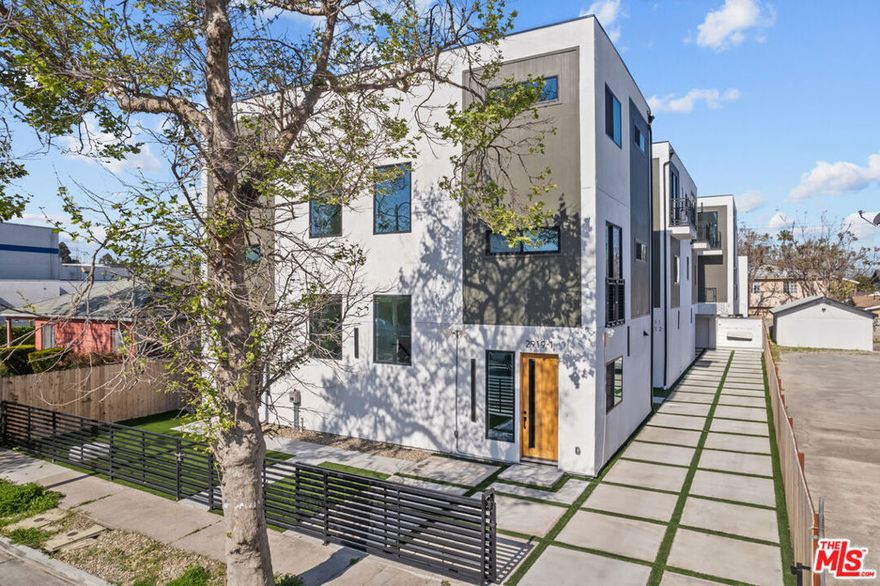5.75% Cap Rate. 2923 S Burnside Avenue is a brand-new collection of seven fully-leased townhome style apartments in the heart of Mid-City, Los Angeles. The property includes four 4-bedroom, 4-bath homes two with private 2-car garages, two 4-bedroom, 3.5-bath homes, and one 3-bedroom, 3-bath home. Units offer assigned parking, in-unit laundry, and private balconies or outdoor spaces, while spacious layouts provide clear separation between living, dining, and bedroom areas for both privacy and comfort. Designed with contemporary architecture and open floor plans, these townhome style units maximize natural light and space. High-quality finishes and thoughtful attention to detail create sleek, modern interiors that are as functional as they are stylish. Every unit provides a combination of livable space and modern amenities that appeal to today's renters. Fully leased and producing consistent income, 2923 S Burnside Avenue offers turnkey investment potential in a high-demand rental market. Brand-new construction ensures minimal maintenance, long-term reliability, and strong cash flow. Located in a prime Mid-City neighborhood with convenient access to central Los Angeles, this property represents a rare opportunity to combine immediate income with long-term stability in the Los Angeles multi-family market.