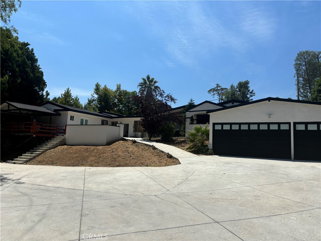 Welcome to 19404 Olivos Dr. nestled in the heart of Tarzana neighborhood. Located on a quiet, tree-lined street with convenient access to shopping, dining, parks, and top-rated schools. This beautifully maintained residence offers 3 bedrooms and 2 bathrooms lapsed across 1830 square feet. Once you step inside, you are welcomed with a spacious, open-floorplan living area leading to a private dining room. The entire residence is blank with hardwood floors and windows bringing bright, natural light. The gourmet kitchen is equipped with stainless steel appliances, a blank island, and custom cabinetry. The primary suite is a private oasis, offering ample closet space. The additional bedrooms are both generously sized offering closet space. One of the bathrooms has been renovated with a spa-like marble shower. The backyard features amiable space for hosting and entertainment. The house features a game room which is not permitted. The pool does not contain water, requiring plaster and repairs. The home also offers a 3-car garage and a large driveway, providing abundant parking for residents and guests. The house is currently under bankruptcy protection and will be sold with court approval.