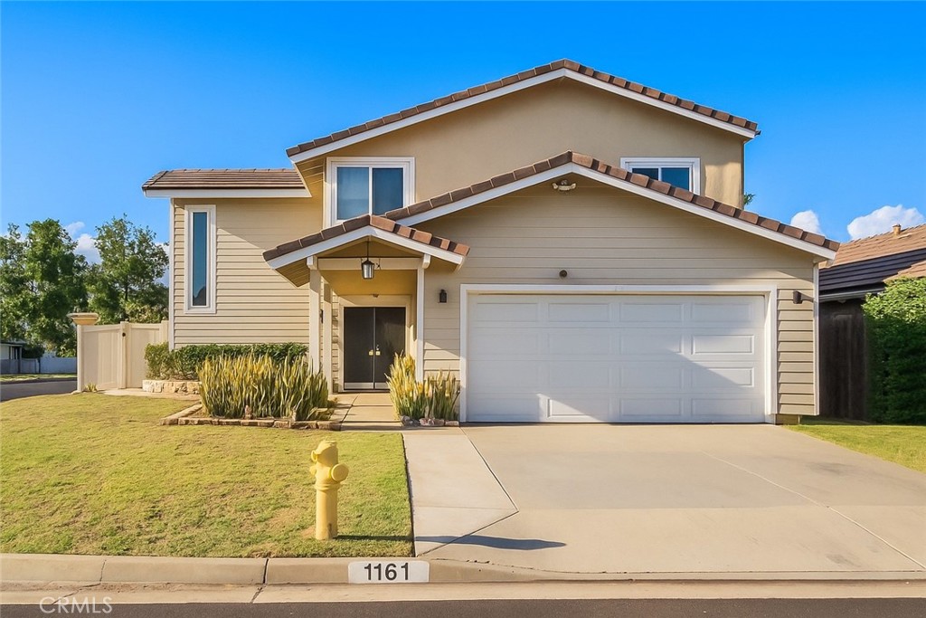 Located in one of San Dimas’ most desirable neighborhoods, 1161 Oakengate Drive offers a perfect blend of space, comfort, and functionality. Situated on a 5,335 sq ft corner lot, this two-story home features 4 good size bedrooms, 2.5 upgraded bathrooms, and 1,758 sq ft of spacious living space.
Step through the double-door entry into the main level, which welcomes you with soaring cathedral ceilings and abundant natural light. The living room features a Decorative fireplace and opens to the formal dining room, ideal for family gatherings and holiday celebrations. The fully remodeled kitchen boasts with bright new quartz countertops and oversized island/breakfast bar, and ample cabinetry, which opens to a family room over looking your own private yard. A guest half-bath tastefully updated is conveniently located on main level. Both the living and family rooms provide access to the backyard, creating a seamless indoor-outdoor flow.
Upstairs, the primary suite includes a oversized walk-in closet and updated private bathroom with new quartz countertops, complemented by three additional well-sized bedrooms and updated bathroom with new quartz counter tops. The backyard provides a perfect setting for relaxation and entertaining, featuring a partially covered patio, grassy area, and versatile shed with french doors included that can serve as a home office, workshop, or storage space.
Additional features include recently fresh interior paint in a few rooms, Newer flooring throughout, updated dual-pane windows and sliders, central A/C and heating, and a 2-car attached garage featuring laundry in garage and an extra room in garage used for storage or darkroom. Residents enjoy access to a private association pool, BBQ area, picnic space, and tennis courts. Centrally located near Walnut Creek Wilderness Park, trails, shopping, freeways, and top-rated schools, this home offers an ideal combination of lifestyle, convenience, and comfort.