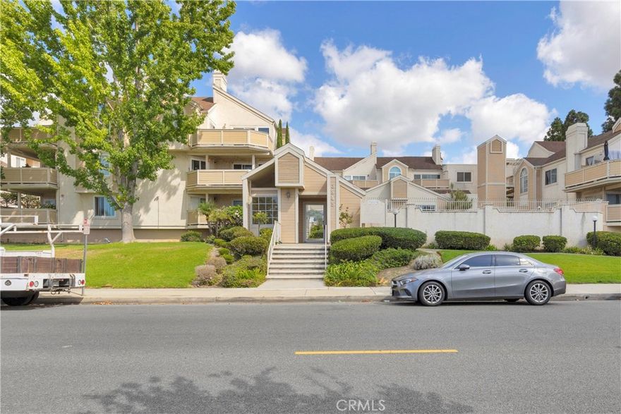 Absolutely Gorgeous! Fully Remodeled 2 Bedroom, 2 Bath Home in Highly Desirable Los Alamitos! Welcome to your move-in ready retreat in one of the most sought-after gated communities in town. This single-level condo offers approx. 900 sq ft of top-of-the-line upgrades and a lifestyle that’s second to none. Step inside to a bright, open-concept floor plan with brand new luxury flooring, fresh paint, recessed lighting, and designer finishes throughout. The gourmet kitchen is a showstopper with white shaker cabinets, quartz counters, bar seating, and stainless appliances—all opening seamlessly to the dining and living areas. Enjoy the cozy fireplace and easy indoor-outdoor flow through sliding glass doors to your private covered patio, perfect for morning coffee or evening entertaining. The spacious primary suite features a remodeled bath with a walk-in shower, while the secondary bedroom and guest bath are equally stylish and modern. Every detail has been carefully finished, making this home truly turnkey. This gated community feels like a private resort with a sparkling pool, spa, and clubhouse for gatherings. Two elevators provide direct access from your private parking garage up to your unit—adding convenience and security. Location, Location, Location! Live just minutes from top-rated Los Alamitos schools, Oak Knoll Park, shopping, dining, and a quick drive to Seal Beach, Alamitos Bay, and all the coastal fun SoCal is known for. With easy freeway access (405, 605, 22, 91), commuting and weekend getaways couldn’t be easier. This is the rare Los Alamitos gem you’ve been waiting for—modern, move-in ready, and in a highly desirable neighborhood. Don’t miss it!