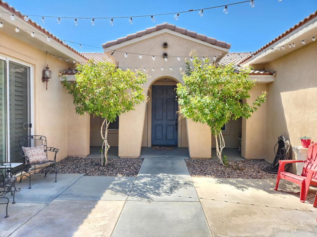 The Real Happiest Place on Earth - Right Here in La Quinta! 🌴Think the happiest place is in Anaheim? Think again! This beautifully maintained home in La Quinta will have you smiling from ear to ear. With a spacious layout, GREAT for entertaining because you have an oversized great room and kitchen, a dedicated home office, and a charming laundry room full of personality, every inch of this home was designed with comfort and function in mind.Step into the spa-like primary bathroom featuring a soaking tub and separate shower, perfect for unwinding after a desert day. The walk-in closet was custom designed for a true shoe lover! And just wait until you see the incredible backyard - private, lush landscaping with palm trees that you will view from nearby neighbors. Enjoy sunset chats around the firepit, host BBQs under the covered patio with ceiling fans or set up corn hole to play with family and friends.Whether you're working from home or entertaining under the stars, this home has it all. Located in one of La Quinta's most desirable neighborhoods. The community has a park with other green belt areas that are great for walking your pets or exercising or riding bikes and there is Bocce Ball. This is your happy place...waiting for you to make it your home!