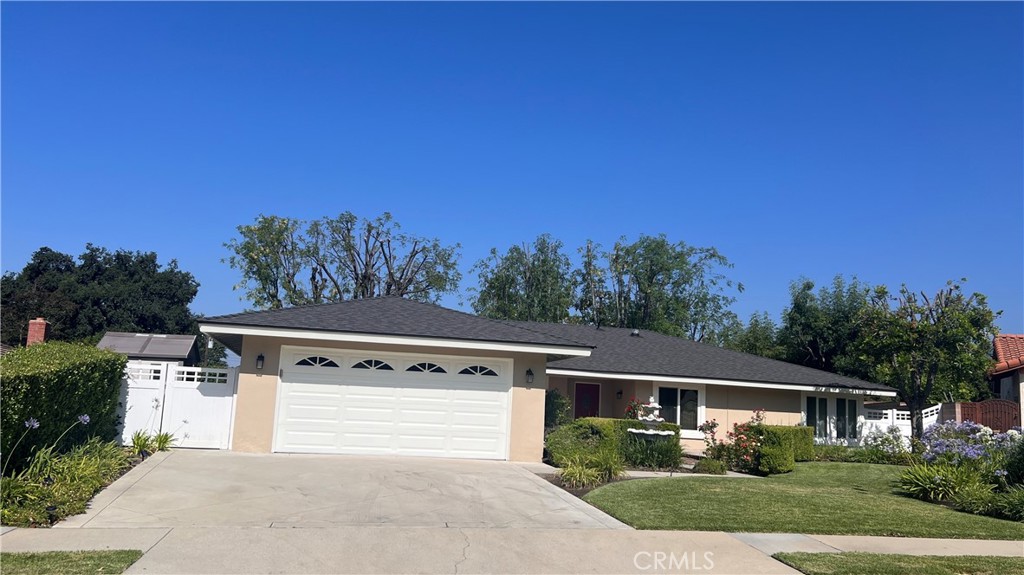 Executive Home in a Million+ North Glendora location. Cul De Sac, walking distance to the Glendora Country Club Golf Course. Highly rated Glendora Schools. New roof and updated fresh new exterior painting. Upgraded through-out with double pane Milgard windows, doors & recessed lighting with dimmers. Spacious kitchen with island, Granite Counter tops & top of the line appliances which include a double-drawer dish washer and brand new stainless steel gas cooktop. 3 bedrooms with wood floors/ newer carpets, mirrored closet doors & ceiling fans. Master bedroom has 2 closets, a spacious walk-in closet with custom-organizers & motion-sensor lights, and a second closet with mirrored sliding doors. Two of the bathrooms have granite counters and newer fixtures with heated bathroom vent fans. Big Living Room with surround-sound wall-mounted speakers and wood floors which opens up to a beautiful serene backyard setting through sliding doors.Dining Room with Crystal Chandelier & plantation shutters. Separate Family room with fireplace & ceiling fan. 2 Car Attached Garage with new automatic door opener & 2 remotes. Separate Laundry room with sink. House has great curb-appeal with beautiful plush flower gardens and a water fountain. New Covered solid patio wired with speakers, recessed lighting and ceiling fans to entertain your friends. New Vinyl Fence for privacy.
Front-yard & Backyard have automatic sprinklers with timer and an area for BBQ. Side Shed for storage.