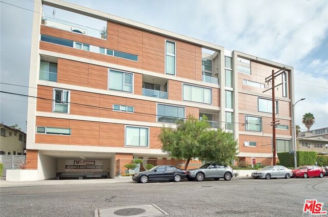 Absolutely stunning views of the Iconic Hollywood Hills! Open spacious floor-plan with huge windows and amazing flow. An impeccable, newly and fully renovated 4th floor, 3-bedroom, den/office, and 3.5-bathroom condo. Unit features: Pedini Cabinetry, Walnut and Terrazzo floors, Hansgroe and Duravit bathroom fixtures, brand-new high-end SS appliances as well as a large balcony. Luxurious building with a 24/7 concierge, club/entertainment room, gym, and a pool, as well as with designated 2 side-by-side underground parking spots. This perfectly-kept, modern building is one block away from restaurants and shops of one of the most historic and bustling locations in of Los Angeles/Hollywood. Walking minutes away from the metro stop and other amenities.