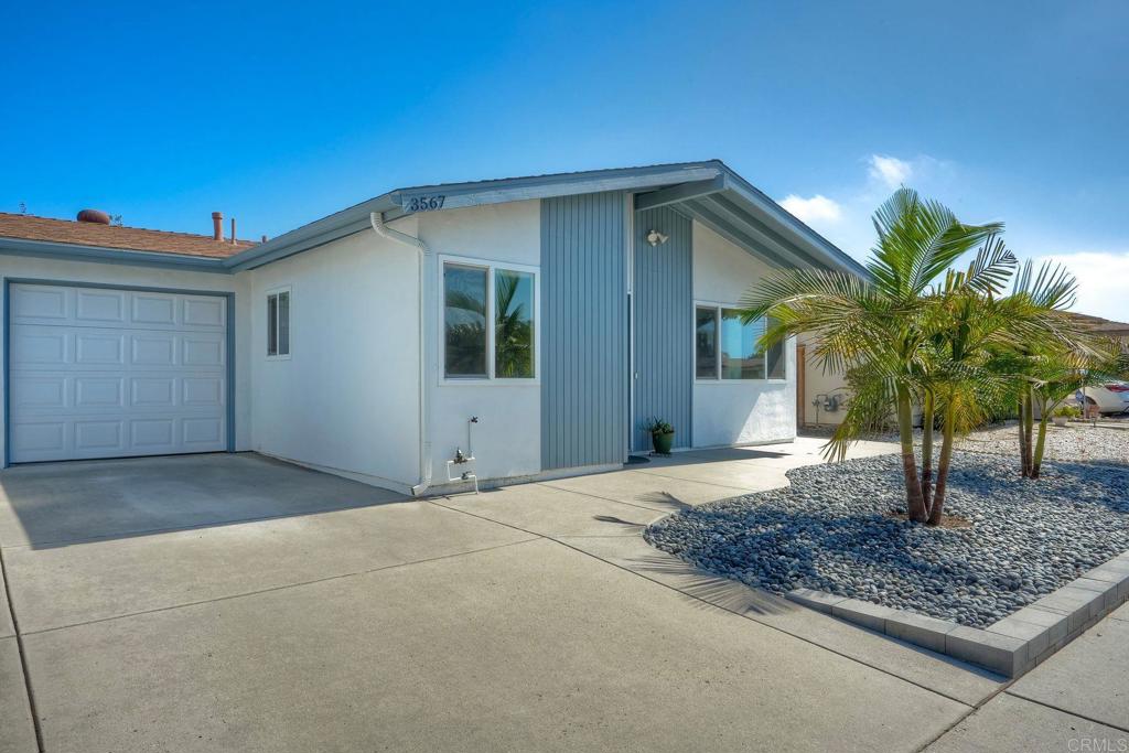 Welcome to this beautifully expanded & permitted 3-bedroom, 2-bath gem nestled in the desirable Costa Serena retirement community. This immaculate, move-in ready home boasts a fully remodeled kitchen featuring brand-new cabinets, quartz countertops, subway tile backsplash, stainless steel appliances- including a 5 burner stovetop and a stylish built-in hutch for extra storage and counter space. Dual pane windows throughout! Freshly painted inside and out, the home offers fantastic curb appeal and modern charm. Step outside to enjoy newly landscaped front and back yards, designed for low maintenance and drought tolerance — complete with new concrete work, rain gutters, river rock, and three majestic King Palms. Don't miss the chance to own this coastal retreat just minutes from the beach, shopping, Trader Joe's, transportation and medical facilities. NO HOA.