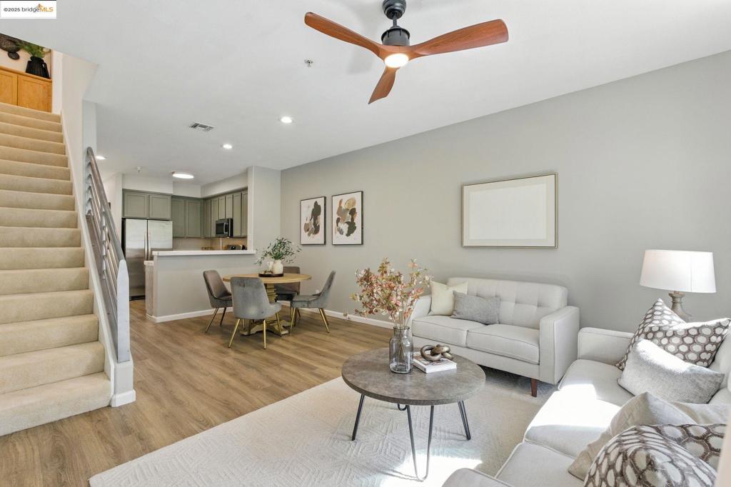 This Metro Walk townhome combines practical design w/a prime central Richmond location. The 1,482 sqft layout offers 3 bdrms & 3 full ba, w/flexibility for work, guests, shared living. The 1st floor foyer opens to a bonus space, well suited for a den, media room, or casual family hangout that connects to a lrg garage w/ample storage, ideal for hobbies/extra gear. The 2nd flr is the main gathering space, w/an open LR/DR & a kitchen w/stainless steel appliances & modern sage-green cabinetry. Double-paned windows invite abundant natural light. A bdrm w/full ba on this level offers options for home office or guest stay. Upstairs are two private suites, w/roomy closets & built-in storage. One suite includes double sinks & a small balcony. This versatile home is bright, airy, & uncomplicated. Recessed lighting & laundry hookups add convenience. Exterior upkeep & landscaping are handled by the HOA, & includes a grassy park & picnic area. BART is steps away, w/shops, restaurants, & the Richmond waterfront nearby. Kaiser Medical Center, regional parks, & everyday conveniences are close. The best part? You’re about 15 min frm Berkeley/Marin. Heading to SF? Hop on the Ferry. This convenient location is a great fit for commuter, outdoor enthusiasts, & investors alike.