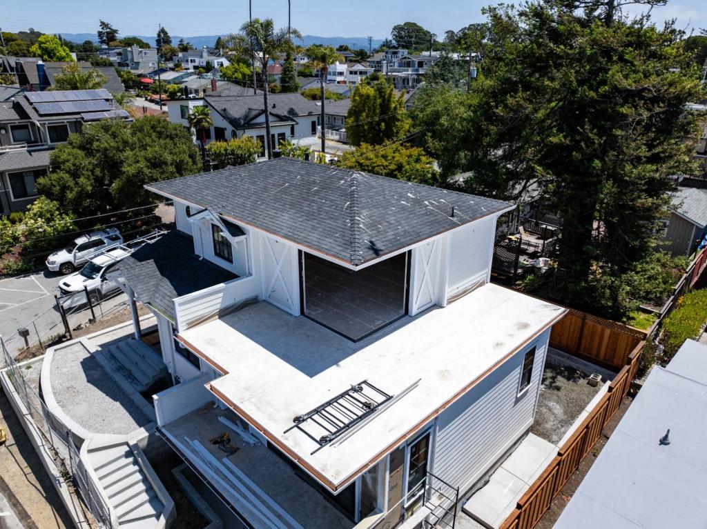 Location, Location, Location! Rare opportunity to own a new construction home overlooking the Santa Cruz Harbor with stunning views out to the sea. This meticulously designed 2,629 sq ft residence is already halfway completed, plans have been approved, and permits are in place. The floor plan is thoughtfully oriented to maximize natural light and showcase the harbor views throughout the home. Enjoy approximately 778 sq ft of outdoor deck space for entertaining or relaxing, plus a 224 sq ft garage for added convenience. Homes like this new construction in this premier harbor location seldom come on the market. Just a short stroll to Twin Lakes Beach, restaurants, cafes, and all the amenities the harbor has to offer. Estimated completion is 4 to 5 months, offering a chance to add your personal touch to the final stages. A full set of architectural plans is available upon request. Don't miss this unique coastal lifestyle opportunity in one of Santa Cruz's most desirable waterfront neighborhoods!