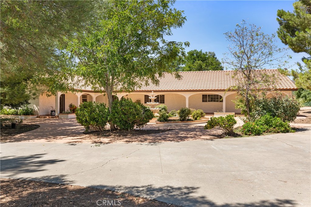 Two amazing single story ranch homes on over 7 acres of elevated, panoramic view acres!!! Main house is a 5 br 4 bathroom +/- 4200 sf home with updating throughout! Massive mudroom, sweeping kitchen and views of newer pool and bbq area from kitchen/living room and dining room! Electric gate entry with storybook long driveway draped with beautiful trees! Lots of mature landscaping and shade! Second home is +/- 1400 sf with 2 bedrooms, 2 bathrooms, indoor laundry and single car garage. It also has separate rear entrance and fenced rear yard. There are about 6 acres of flat, usable land for anything you can think of! Future owner can split of 2.5 acres and sell or build ANOTHER home! With this much land the opportunities are unlimited! Two large water tanks! High performing well! This is a once a decade kind of home!!!