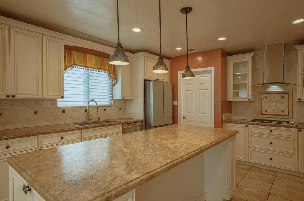I would judge this to be an exceptional house-solid, spacious, efficient and clean--a home of quiet luxury, without pretense, where comfort, elegance, and convenience converge in one of Pacific Grove's desirable hillside neighborhoods. Families will appreciate the home's location within the vaunted Pacific Grove Unified School District. The home has three downstairs bedrooms, and one large one above the garage--or you could look at that large one as a bonus room, to be customized to suit your interests. The three downstairs bedrooms are spacious, and they--along with the living and dining areas--have oak floors, for a warm and welcoming feeling. The kitchen is very efficiently designed, with warm-toned granite countertops, both functional and beautiful. It features a central island and custom cabinetry that blend seamlessly with the home's calm, elegant aesthetic. The cooktop is gas. Exterior paint is new, the garage has new doors, fresh epoxy floors and is as clean as a whistle--as is the whole house. As to its location--well, it IS Pacific Grove, so every location is great, but the particular draw of this neighborhood is that you merely go out your door and you have a two minute walk-just steps away-to local shops, restaurants, and top-rated schools.