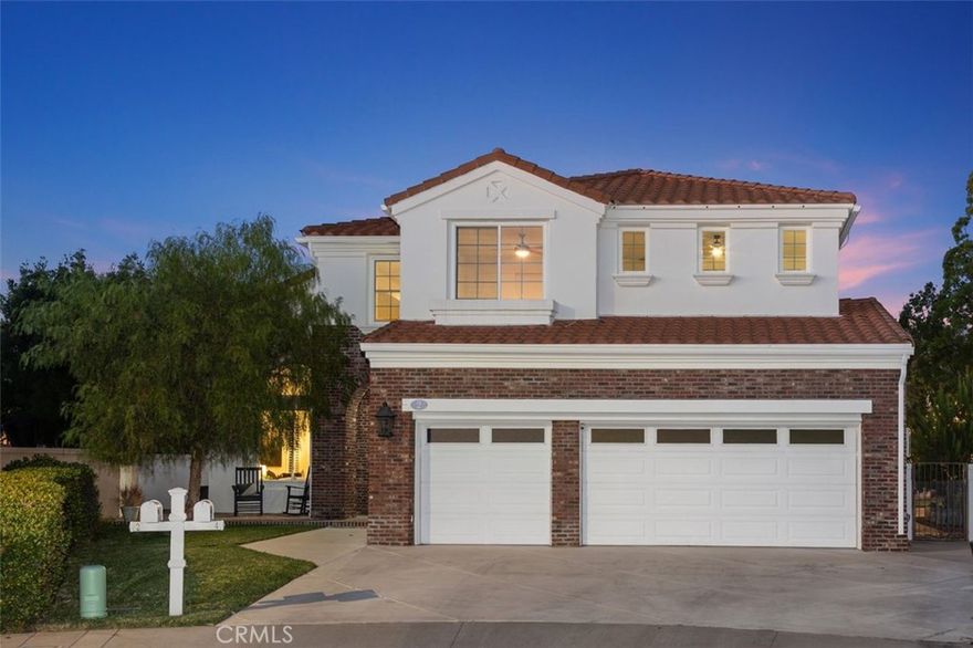This is the largest lot in Melinda Heights with a pool and a view. Located at the end of a cul-de-sac, this two-story home offers 5 bedrooms, 3 bathrooms, and 2,876 square feet of living space on an 11,470 square foot lot. The home includes a 3-car attached garage and paid-for solar. 

The exterior features a brick-accent façade, a covered front entry with double doors, and a front patio area. The interior has been recently repainted and offers high ceilings, crown molding, and large windows. Flooring includes dark wood-look tile on the main level and plush carpet upstairs. The formal living room has two-story ceilings and abundant natural light, and the formal dining room has direct access to the backyard through sliding glass doors. The remodeled kitchen includes white shaker cabinetry, quartz countertops, a large center island, and a herringbone-pattern backsplash. A farmhouse sink overlooks the backyard and mountain views. The kitchen opens to a family room with a fireplace and folding glass doors. The main floor also includes a bedroom/office with a ceiling fan and a bathroom with a shower.



Upstairs, there is a loft/tech space with built-in cabinetry. Secondary bedrooms feature ceiling fans and mirrored closets. A hall bathroom includes dual sinks and a separate shower/tub area. The primary suite offers large windows with mountain views and a walk-in closet with built-in shelving. The primary bathroom includes dual sinks, a soaking tub, and a separate shower. The backyard features a custom pebble-tech pool and spa with cascading waterfalls, a gas fire pit with seating, a grass area, and wide open mountain views. This home combines an updated interior with resort-style outdoor living, all in a private cul-de-sac location.