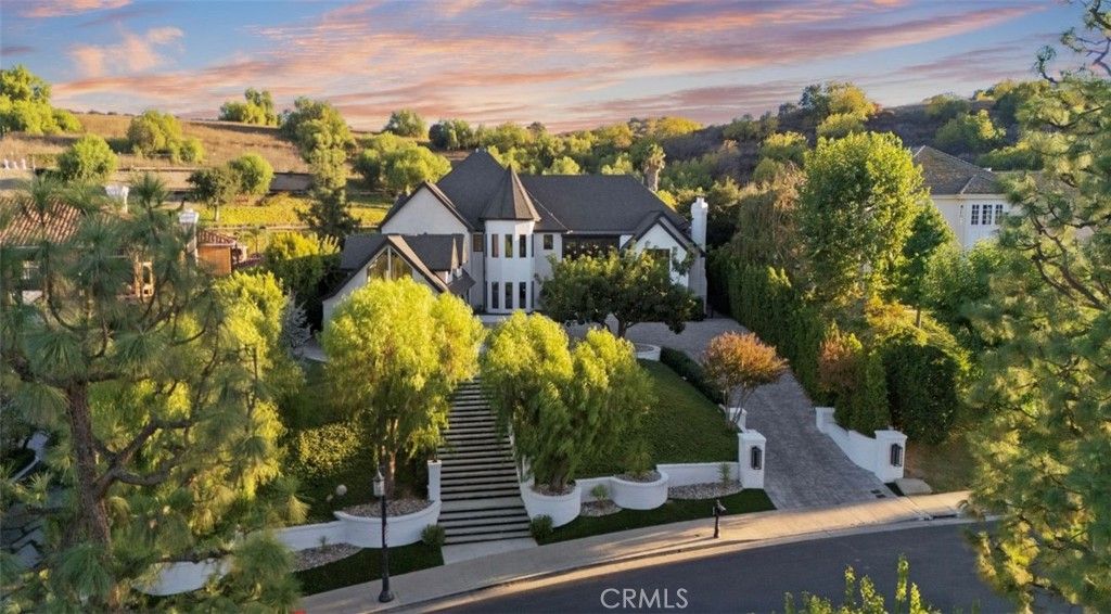 Photo of 20620 Chatsboro Drive, Woodland Hills, CA 91364 (MLS # SR25241142)