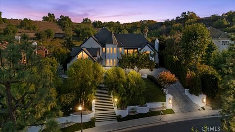Photo of 20620 Chatsboro Drive, Woodland Hills, CA 91364 (MLS # SR25241142)