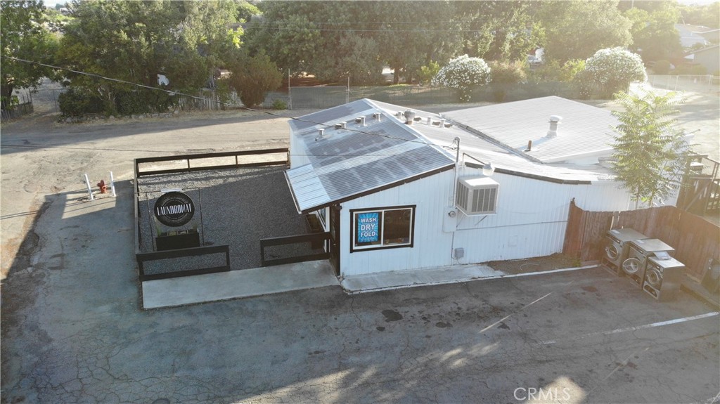 Rare opportunity to own an operating and fully remodeled laundromat with rental income. This Kelseyville location features a fully upgraded laundromat plus a mobile home that is currently rented, providing additional income. The laundromat is located in a prime, walk able area with steady customer traffic. The facility comes equipped with full remote-control capability from your phone, allowing you to lock doors, turn lights and A/C on or off, and access security cameras at any time. A full security system is in place, and all laundry equipment is included, making this a true turnkey opportunity for an investor or owner-operator seeking strong cash flow from day one. Total approximate square footage includes the laundromat and the mobile home added together, buyer to verify. Additional Opportunity: There is also another remodeled laundromat for sale in Nice, CA at 3508 E State Hwy 20, which includes a second commercial unit that is currently rented and a fixer mobile home. Both properties can be purchased together as a package deal for $1,250,000.
With the brand-new Kelseyville Terrace apartment complex currently under construction nearby -featuring 69 units- this location has even more potential for increased business.