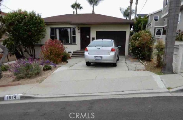 Welcome to 1814 Pullman Lane, a unique and versatile duplex in the heart of Redondo Beach. This property features two detached units on a spacious lot with multiple outdoor areas and ample parking spaces. The front unit (2 Bed/1 Bath) features a bright open kitchen, sizable bedrooms and hardwood floors throughout. Tucked away at the back of the property (3 Bed/ 2 Bath), the rear unit features a larger footprint that is over 1800 SQ Feet. The layout includes a full kitchen, open dining/living area, and direct access to the private rear patio — ideal for entertaining, relaxing, or gardening. Additional features of the property include dual driveways, 2 garages and a large deck. Located near award-winning schools, local parks, and just minutes from Hermosa and Manhattan Beach, this is a prime opportunity to own a move-in-ready duplex in one of the most desirable South Bay communities