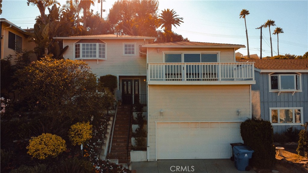 Set on a quiet hillside street with uninterrupted ocean views from multiple levels, 2333 S Patton Avenue is a rare offering in one of San Pedro’s most scenic pockets. This 3-bedroom, 3-bath home features approximately 1,940 sq ft of living space on a generous 8,162 sq ft lot, offering both scale and privacy with no neighbors behind and wide-open sky above.
The main level living area opens to an expansive ocean-facing front deck where you can watch ships glide through the harbor and enjoy cool coastal breezes. Nearly every level of the home captures sweeping views of the Pacific, including a second elevated deck in the backyard—ideal for entertaining, relaxing, or taking in the sunset.
The home is in well-maintained, mostly original condition, offering an exciting opportunity to enhance and customize over time without paying the premium of a recent remodel. Generous room sizes, natural light, and a versatile floor plan provide excellent bones for a buyer with vision.
Located minutes from oceanfront parks, hiking trails, top-rated schools, dining, and the amenities of coastal San Pedro, this home offers the perfect blend of lifestyle, location, and long-term potential.