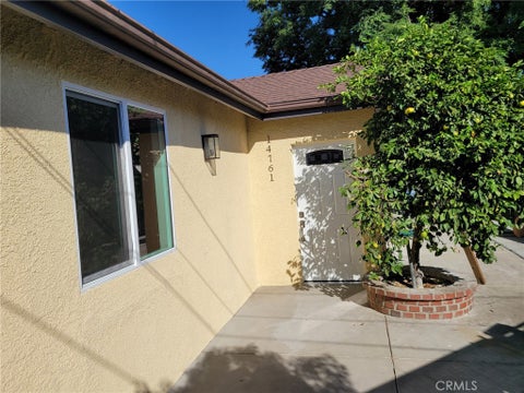 Photo of 14761 W Lassen Street, San Fernando, CA 91345 (MLS # SR26213951)