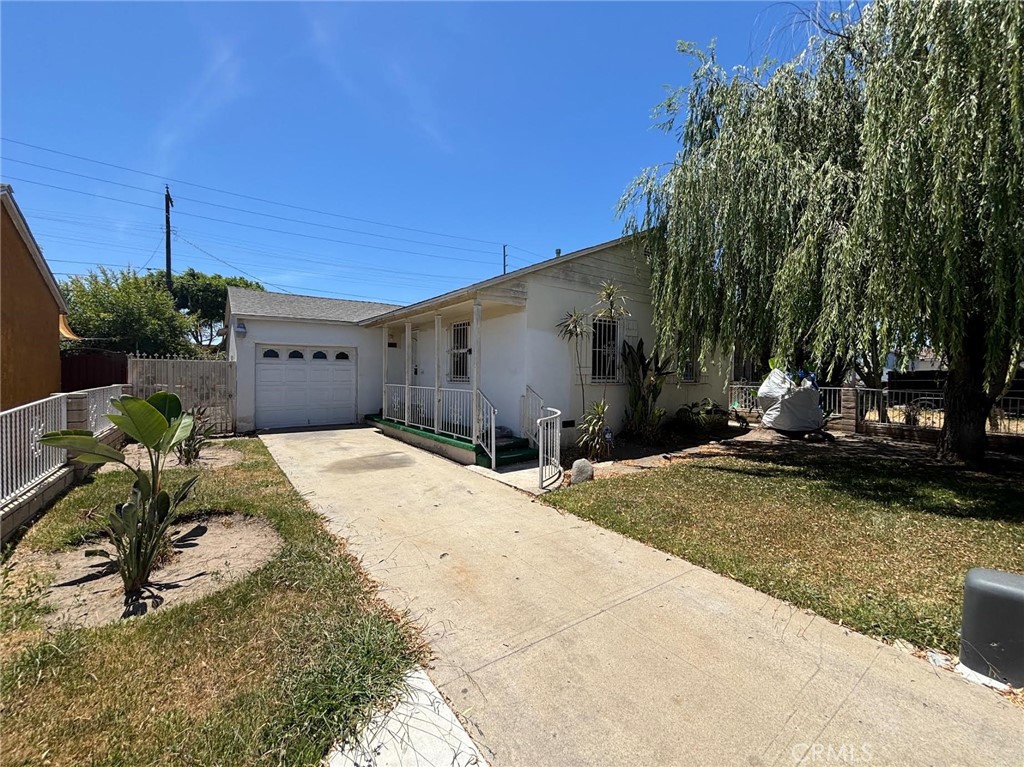 Welcome to this lovely 2 bedroom, 1 bathroom Compton home! With nice updates to the kitchen and bath, recessed lighting, windows, tankless water heater, functioning electric driveway gate, and generous size lot, this property is ready to be yours. Call today to make your appointment!
