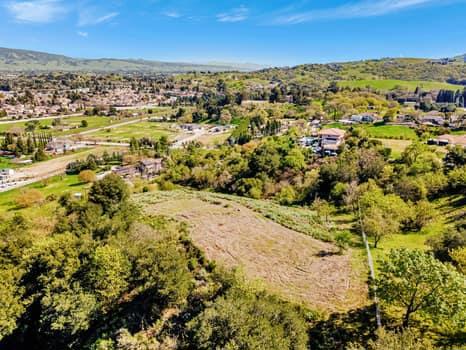 Panoramic mountain and South County views from the top of this Paradise Valley Acreage- yet close to town. Build your dream home in Morgan Hill, on one of the last mountain tops available. Almost another world at the top of this property with its tranquil privacy and breathtaking views. With approvals you can build a 3550 sft home plus 1200 sft second unit. Well was successfully drilled in 2021. Alternative septic system plan (result of the field perc test) was approved by County of Santa Clara. This property offers privacy and views with the conveniences of town just a short drive or walk away!! Buyer to verify all information with Santa Clara County.