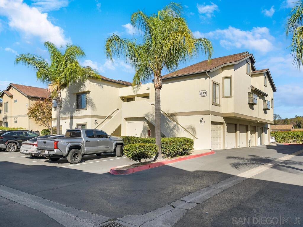 Great value awaits! Welcome to your new home in the highly sought-after Avocado Village community of La Mesa! This beautifully remodeled 2-bedroom, 1-bath condo offers 1,012 sq. ft. of modern comfort and effortless style. Step inside to discover fresh paint and new LVP flooring throughout. The stunning kitchen features brand-new LG appliances, perfect for both everyday meals and weekend entertaining. Enjoy the ease of in-unit laundry and the comfort of central air conditioning. The spacious primary bedroom includes a generous walk-in closet, while the large covered patio invites you to relax with morning coffee or unwind after a long day. Parking is a breeze with a deep one-car garage offering extra storage, plus an additional assigned space. Avocado Village is a beautifully maintained community featuring lush landscaping, ample guest parking, and resort-style amenities including a sparkling pool and jacuzzi. FHA and VA approved for added buyer flexibility. Whether you’re looking for a move-in ready home or a smart investment opportunity, this property offers excellent rental potential thanks to its desirable location, modern upgrades, and strong community appeal. Experience the perfect blend of comfort, convenience, and community in this exceptional La Mesa home! Nestled in the foothills of La Mesa, Avocado Village is a peaceful and well-maintained condominium community known for its lush landscaping, mature trees, and welcoming neighborhood atmosphere. Residents enjoy a relaxed lifestyle with access to a sparkling community pool, spa, and plenty of guest parking—all within a serene, park-like setting. Located just minutes from shopping, dining, and everyday conveniences, Avocado Village offers the perfect blend of comfort and accessibility. Nearby you’ll find popular retail centers, local restaurants, and coffee shops, as well as scenic parks and hiking trails. Commuting is made simple with easy access to the 94 freeway, connecting residents to downtown San Diego, Mission Valley, and beyond in just minutes. With its tranquil surroundings, convenient location, and strong sense of community, Avocado Village offers an exceptional living experience in one of La Mesa’s most desirable neighborhoods.