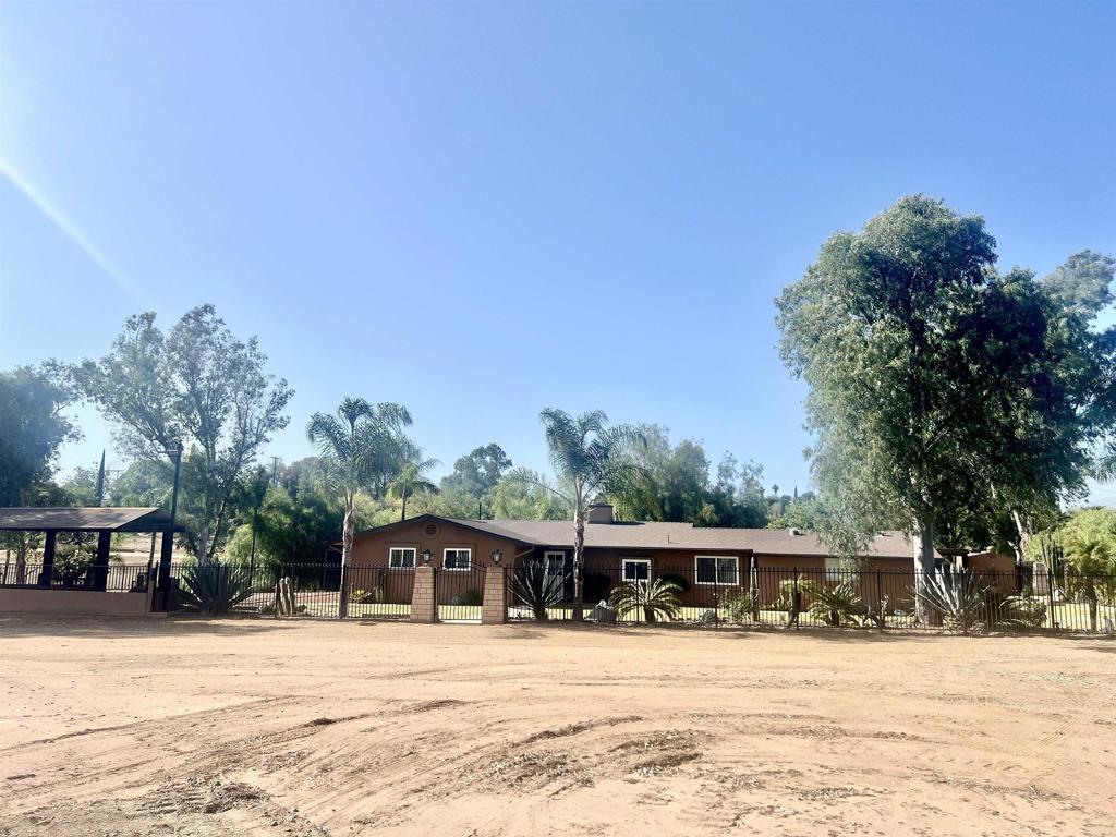 Spectacular totally flat 3 acres lot, former equestrian training facility, great potential and private property. This home has been updated with newer roof, double pain windows, newer baths, kitchen, 2 master suites, ceramic tile and carpet floors, paint. Home office is perfect for in-home business. Big sturdy metal beams barn/stable with concrete floor, room for many stalls, RV parking, wash-rack, turn-outs, off-road vehicle track, play-yard. Equestrian arena's fence got removed but could be built back., great patio for entertaining along with huge front and rear yards. Patio w/ firepit. Easy access to trails. Less than 5 min V.C. schools.