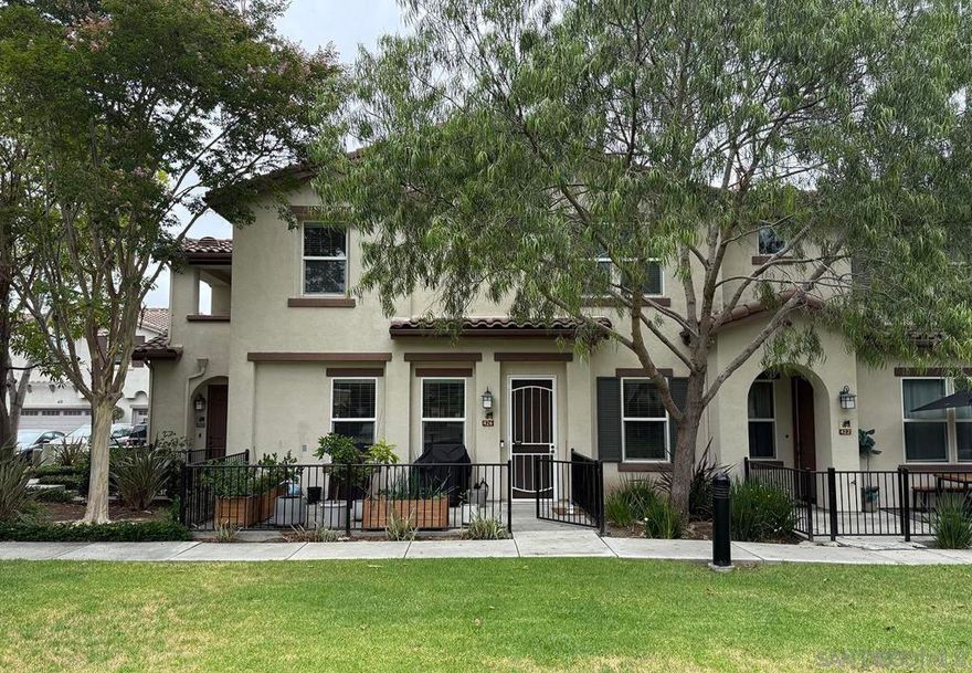 This beautiful 3-bedroom townhome from 2007 with an attached 2 car garage  is set in a lovely environment overlooking a greenbelt and play area. Part of the Santa Fe Walk HOA this Highly upgraded and modernized home features lighted ceiling fans, numerous lights on dimmer, an updated kitchen and new luxury vinyl flooring throughout. With a sunny exposure and an adorable patio open to the greenbelt you'll fall in love with this little gem. It also boasts a great walkability score—Downtown Vista, with its restaurants and farmers market, is just a short stroll away, and the train station to Oceanside is nearby.